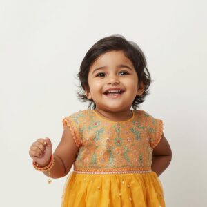 Home indian toddler wearing a festive dress